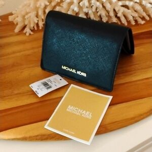 Michael Kors 🔥 NWT 🔥 black MD slim wallet jet set. NEVER WORN!